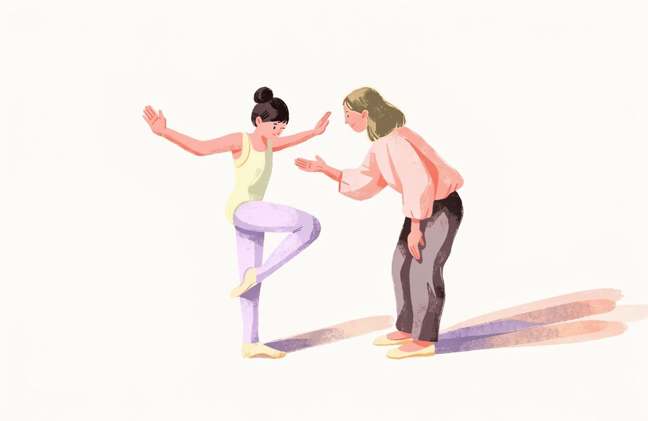 A girl balancing with her coach’s steadying hand